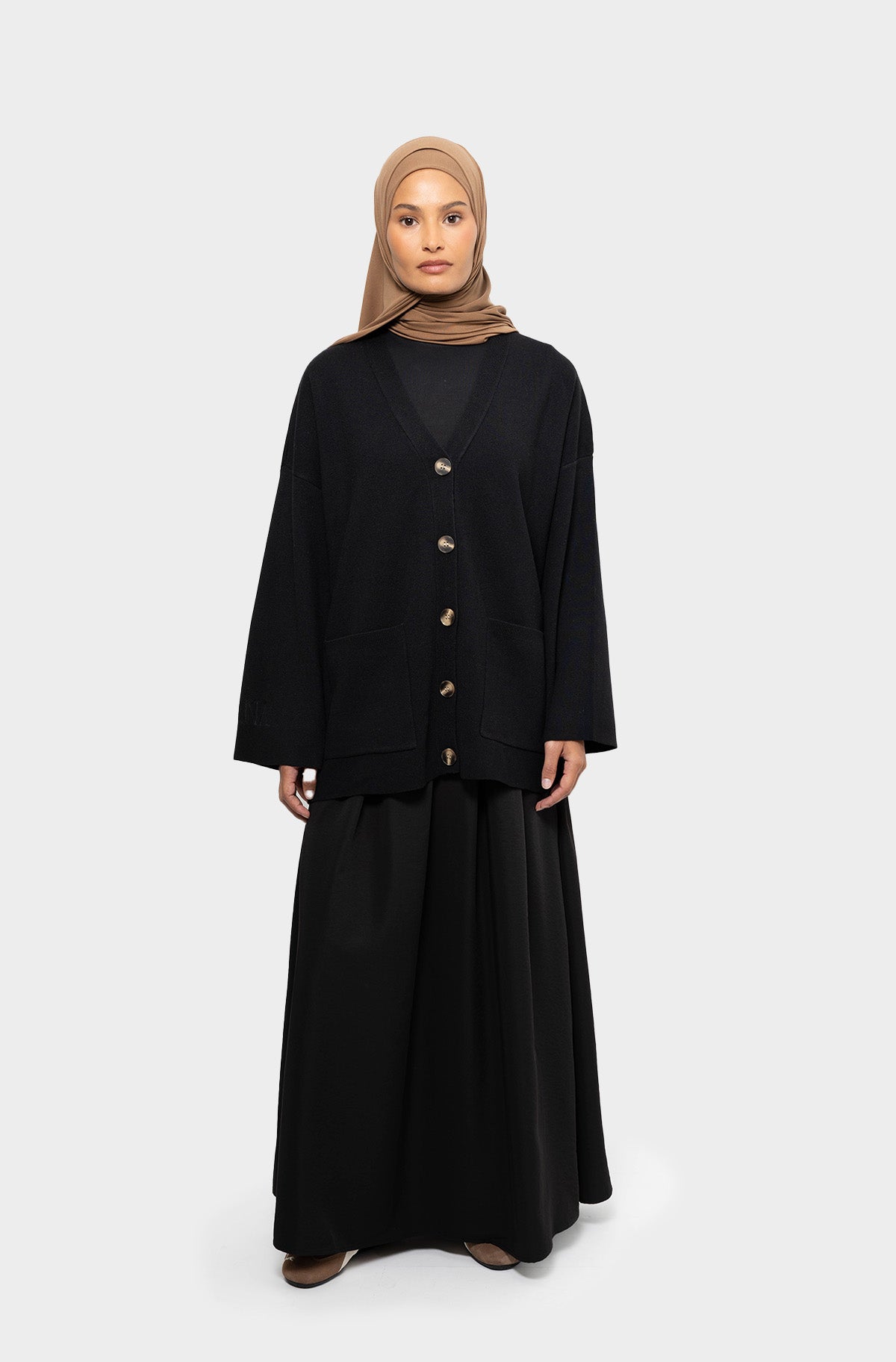 Black short cardigan in merino wool