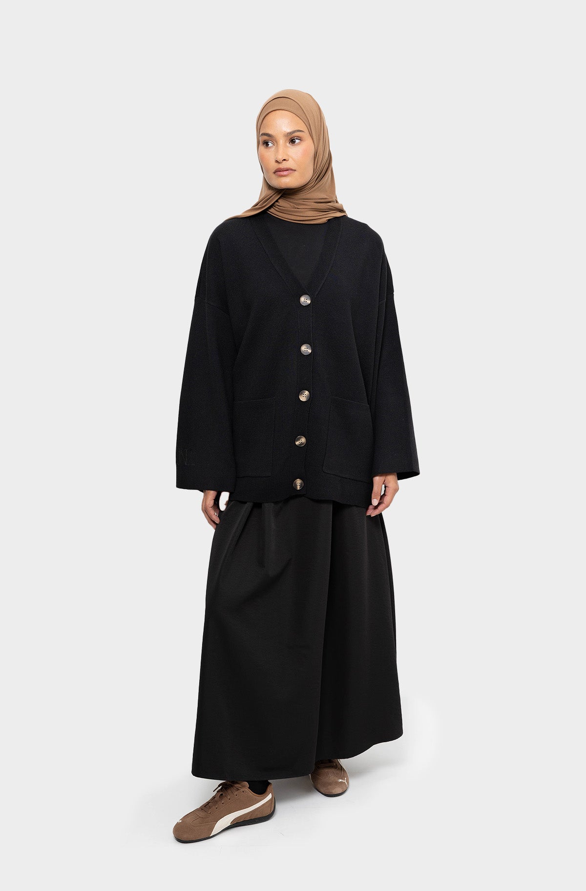 Black short cardigan in merino wool