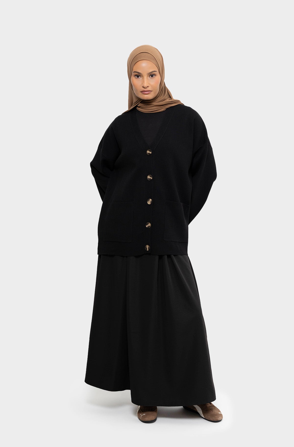 Black short cardigan in merino wool