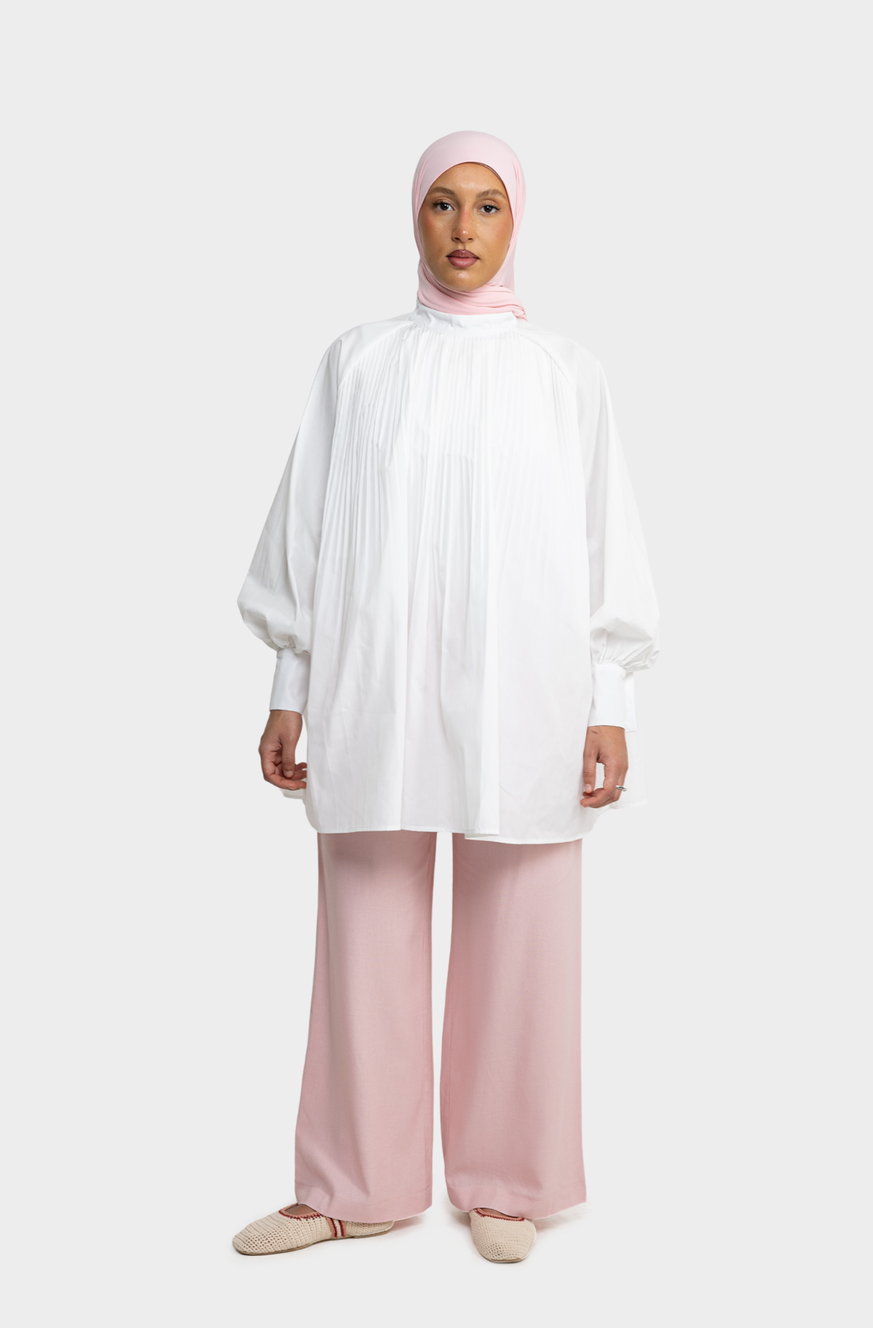 White pleated shirt